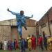 Seorang peserta melakukan pemanasan jelang Tur Seni Bela Diri Kenya di wilayah Kiambu, Kenya, pada 13 Juni 2021. Sebanyak 59 peserta dari 7 klub seni bela diri lokal ambil bagian dalam acara yang diselenggarakan oleh Asosiasi Seni Bela Diri Kenya itu pada Minggu (13/6). (Xinhua)