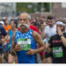 Para peserta berlari dalam ajang maraton internasional Rimi Riga di Riga, Latvia, pada 29 Agustus 2021. (Xinhua/Edijs Palens)