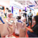 Seorang pengunjung memotret sejumlah robot di ajang China-ASEAN Expo ke-18 di Nanning, ibu kota Daerah Otonom Etnis Zhuang Guangxi, China selatan, pada 13 September 2021. (Xinhua/Zhou Hua)
