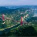  Foto dari udara yang diabadikan pada 23 Juli 2021 ini menunjukkan Jembatan Yachihe di Jalan Tol Guiyang-Qianxi di Provinsi Guizhou, China barat daya. (Xinhua/Yang Wenbin)   