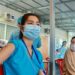 PHNOM PENH, Seorang wanita menerima suntikan dosis keempat vaksin COVID-19 di sebuah lokasi vaksinasi di Phnom Penh, Kamboja, pada 14 Januari 2022. Kamboja pada Jumat (14/1) mulai memberikan dosis keempat vaksin COVID-19 kepada kelompok prioritas di Phnom Penh, ibu kota negara itu, seiring menyebarnya varian Omicron di masyarakat. (Xinhua/Phearum)