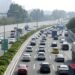 Kendaraan-kendaraan melaju perlahan di jalan tol di sekitar Guangzhou, ibu kota Provinsi Guangdong, China selatan, pada 1 Mei 2021. (Xinhua/Lu Hanxin)