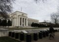Foto yang diabadikan pada 15 Desember 2021 ini menunjukkan gedung Federal Reserve Amerika Serikat di Washington DC, Amerika Serikat. (Xinhua/Ting Shen)