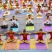Para sukarelawan Skema Layanan Nasional (NSS) berlatih yoga di aula indoor kompleks olahraga negara bagian di Agartala, ibu kota Negara Bagian Tripura, India timur laut, pada 14 Mei 2022. (Xinhua/Str)