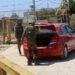 QALIQLYA, Sejumlah tentara Israel memeriksa sebuah kendaraan di pos pemeriksaan dekat Kota Qaliqlya di Tepi Barat pada 19 Juni 2022. Seorang warga Palestina tewas pada Minggu (19/6) oleh tentara Israel ketika dia mencoba untuk melintasi pagar keamanan antara Kota Qaliqlya di Tepi Barat utara dan Israel, menurut otoritas kesehatan Palestina. (Xinhua/Nidal Eshtayeh)