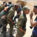 HEBRON, Warga Palestina dan aktivis internasional terlibat bentrok dengan tentara Israel menyusul protes terhadap latihan militer Israel di Masafer Yatta, Kota Hebron bagian selatan, Tepi Barat, pada 22 Juni 2022. (Xinhua/Mamoun Wazwaz)