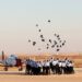 PANGKALAN UDARA HATZERIM, Para kadet melemparkan topi mereka dalam upacara kelulusan Angkatan Udara Israel (Israeli Air Force/IAF) di Pangkalan Udara Hatzerim di dekat Be'er Sheva, Israel, pada 23 Juni 2022. (Xinhua/JINI/Ilan Assayag)