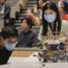 VANCOUVER, Para kontestan mengamati pergerakan robot mereka dalam sebuah kompetisi robot di University of British Columbia (UBC) di Vancouver, British Columbia, Kanada, pada 11 Agustus 2022. Sebanyak 16 tim mahasiswa fisika dan teknik dari UBC berpartisipasi dalam kompetisi robot tersebut pada Kamis (11/8). (Xinhua/Liang Sen)