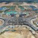 HOHHOT, Foto dari udara yang diabadikan pada 15 Agustus 2022 ini memperlihatkan lokasi pembangunan bandara baru di Hohhot, Daerah Otonom Mongolia Dalam, China utara. Struktur utama terminal di bandara baru di Hohhot telah selesai dibangun. (Xinhua/Li Zhipeng)