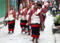 LALITPUR, Sejumlah wanita yang mengenakan pakaian tradisional berpartisipasi dalam parade untuk merayakan Festival Ganesh Puja di Lalitpur, Nepal, pada 16 Agustus 2022. Festival tersebut digelar untuk memuja Ganesha, dewa berkepala gajah. (Xinhua/Sulav Shrestha)