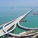 XIAMEN, Foto dari udara yang diabadikan pada 12 September 2022 ini menunjukkan Jembatan Xiang'an setelah proses pengecoran terakhir (closure) di Xiamen, Provinsi Fujian, China tenggara. Jembatan jalan raya sepanjang 12 kilometer ini, dengan bagian sepanjang 4,5 kilometer melintasi laut, dirancang untuk dapat dilalui kendaraan dengan kecepatan hingga 80 kilometer per jam setelah rampung. (Xinhua/CCCC Second Harbour Engineering Co., Ltd.)