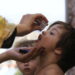 KABUL, Seorang tenaga kesehatan memberikan vaksin polio kepada seorang anak dalam kampanye vaksinasi polio di Kabul, Afghanistan, pada 19 September 2022. Kementerian Kesehatan Masyarakat Afghanistan di bawah naungan pemerintah sementara yang dikelola Taliban memulai kampanye vaksinasi polio nasional selama empat hari pada Senin (19/9). (Xinhua/Saifurahman Safi)