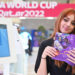 KUWAIT CITY, Seorang wanita menunjukkan beberapa pamflet di stan pameran Piala Dunia FIFA 2022 Qatar di Kegubernuran Al Farwaniyah, Kuwait, pada 22 September 2022. (Xinhua/Asad)