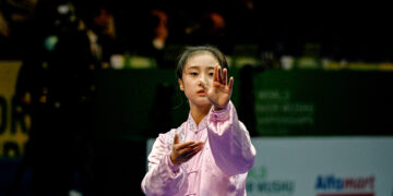 TANGERANG, Atlet China Yang Jin bertanding dalam Grup A Taijiquan Putri di Kejuaraan Dunia Wushu Junior kedelapan di Tangerang, Provinsi Banten, pada 9 Desember 2022. (Xinhua/Agung Kuncahya B.)