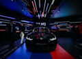 GOYANG, Sejumlah orang mengamati BMW M3 yang dipamerkan dalam ajang Seoul Mobility Show di gedung pameran KINTEX di Goyang, Korea Selatan, pada 31 Maret 2023. Pameran tersebut resmi dibuka pada Jumat (31/3) dan akan berlangsung hingga 9 April. (Xinhua/Wang Yiliang)